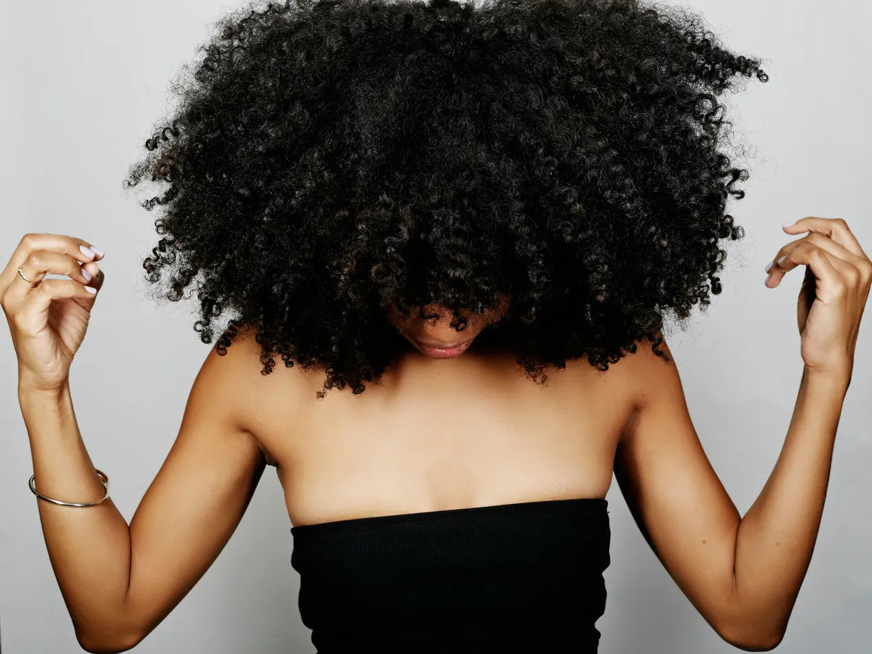 The Ultimate Low-Maintenance Hair Routine for Busy Black Women Who Want Growth